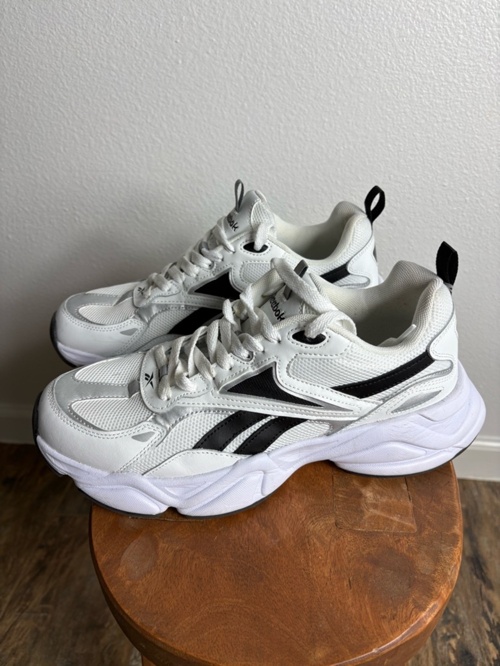 Reebok White Sneakers with Black Logo